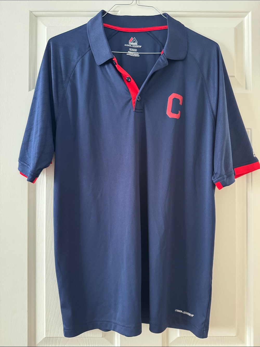 Majestic Cleveland Indians navy blue polo shirt with red accent trim. Size XL.
